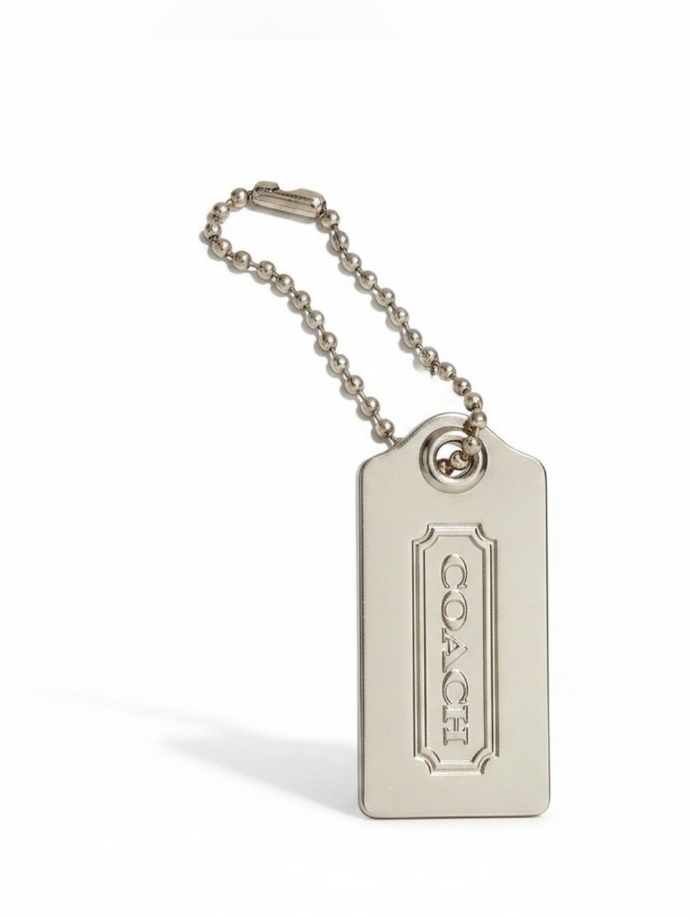 Coach Silvertone Metal Hangtag Measures 2"X1" Aprox.